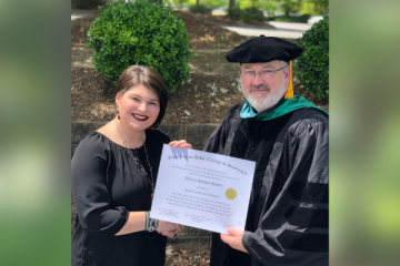 Victoria Bowlin receives her diploma