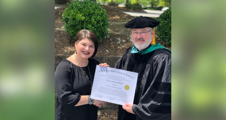 Victoria Bowlin receives her diploma